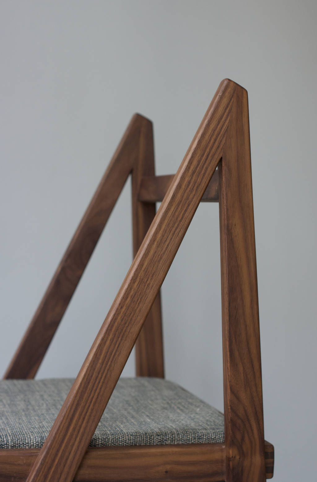 Walnut chair designed by Martin Gillis Studio