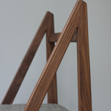 Walnut chair designed by Martin Gillis Studio