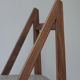 Walnut chair designed by Martin Gillis Studio