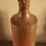 Vintage stoneware liqueur bottle with spout