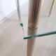Glass and gilded brass pedestal table, 50s