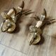 Pair of wheat spike wall lights in gold metal