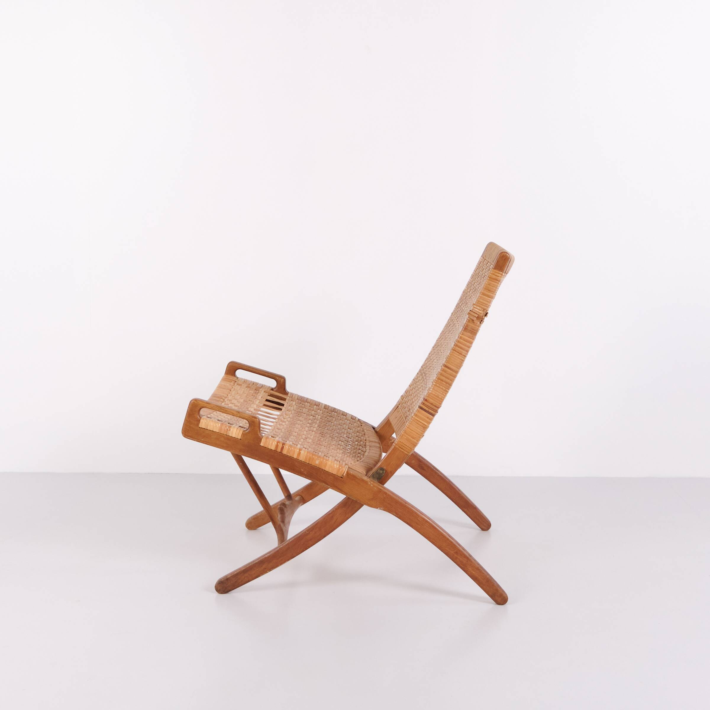 Armchair / folding chair – model JH 512 “The Fireplace Chair” – patinated oak – original cane – Hans J. Wegner – Johannes Hansen – 1950s