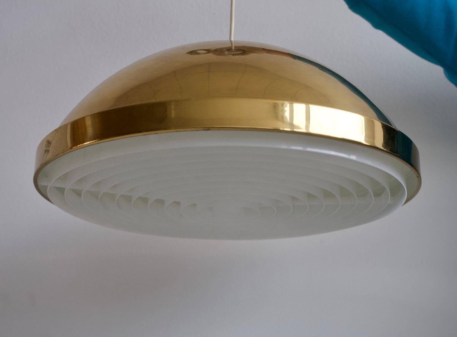 Bergboms ceiling light in brass with acrylic shade.