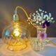 Vintage amber glass globe player