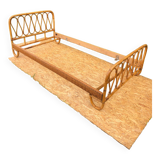 Rattan bed.