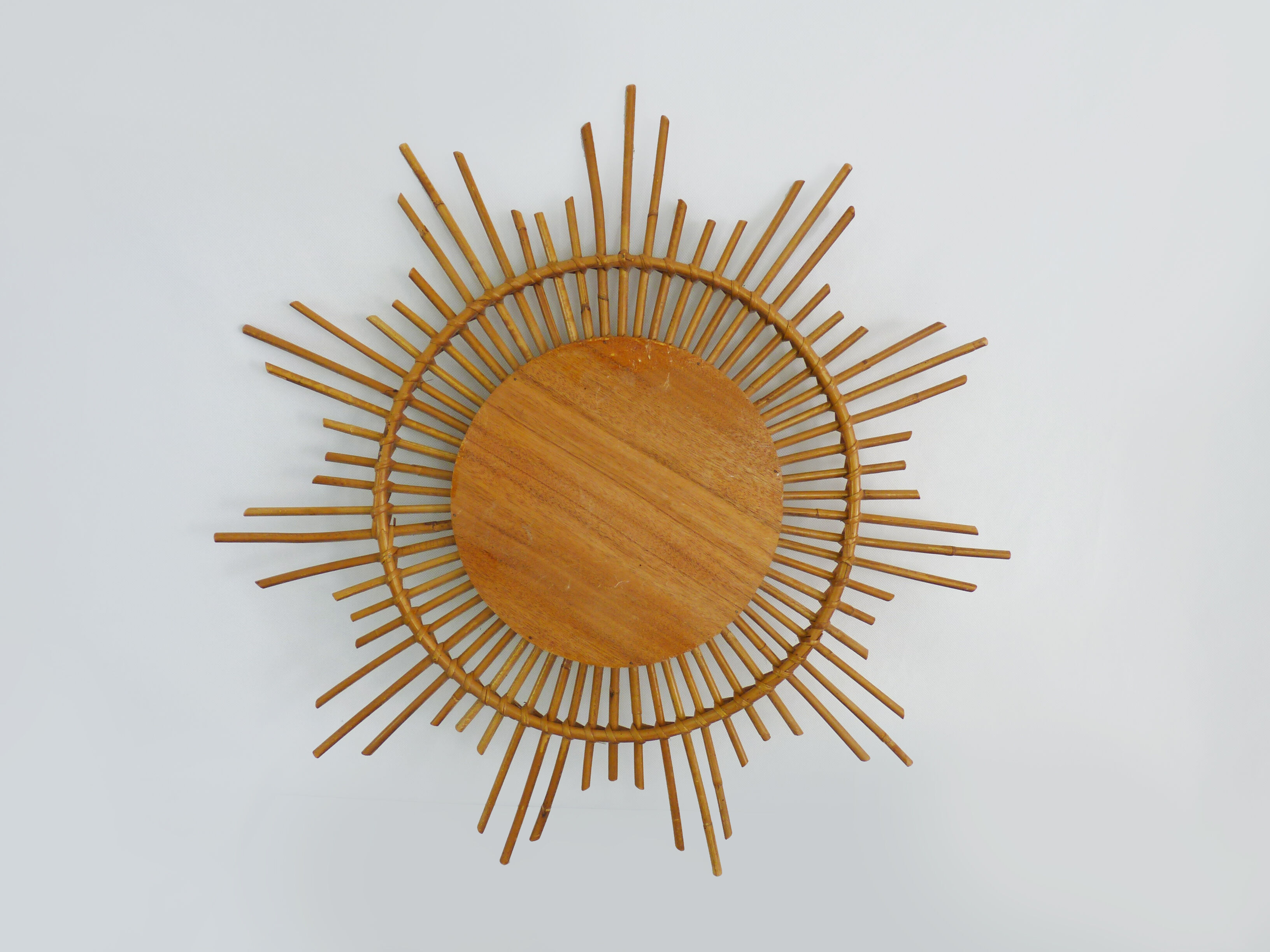 Vintage rattan sun mirror. Year 60