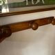 Wooden wall-mounted coat rack