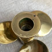Pair of vintage brass propeller-shaped candlesticks