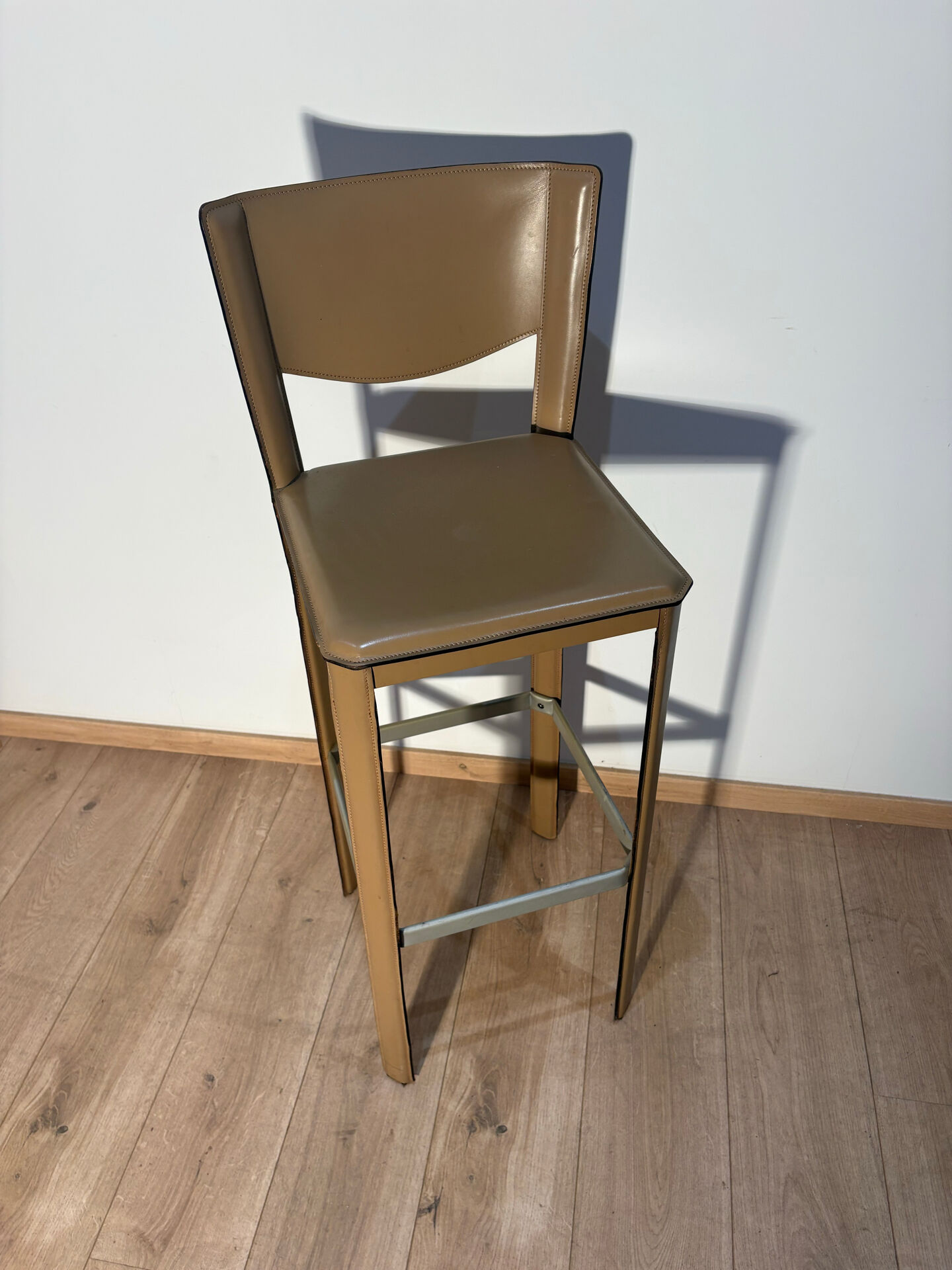 Pair of leather stools Enrico Pellizoni