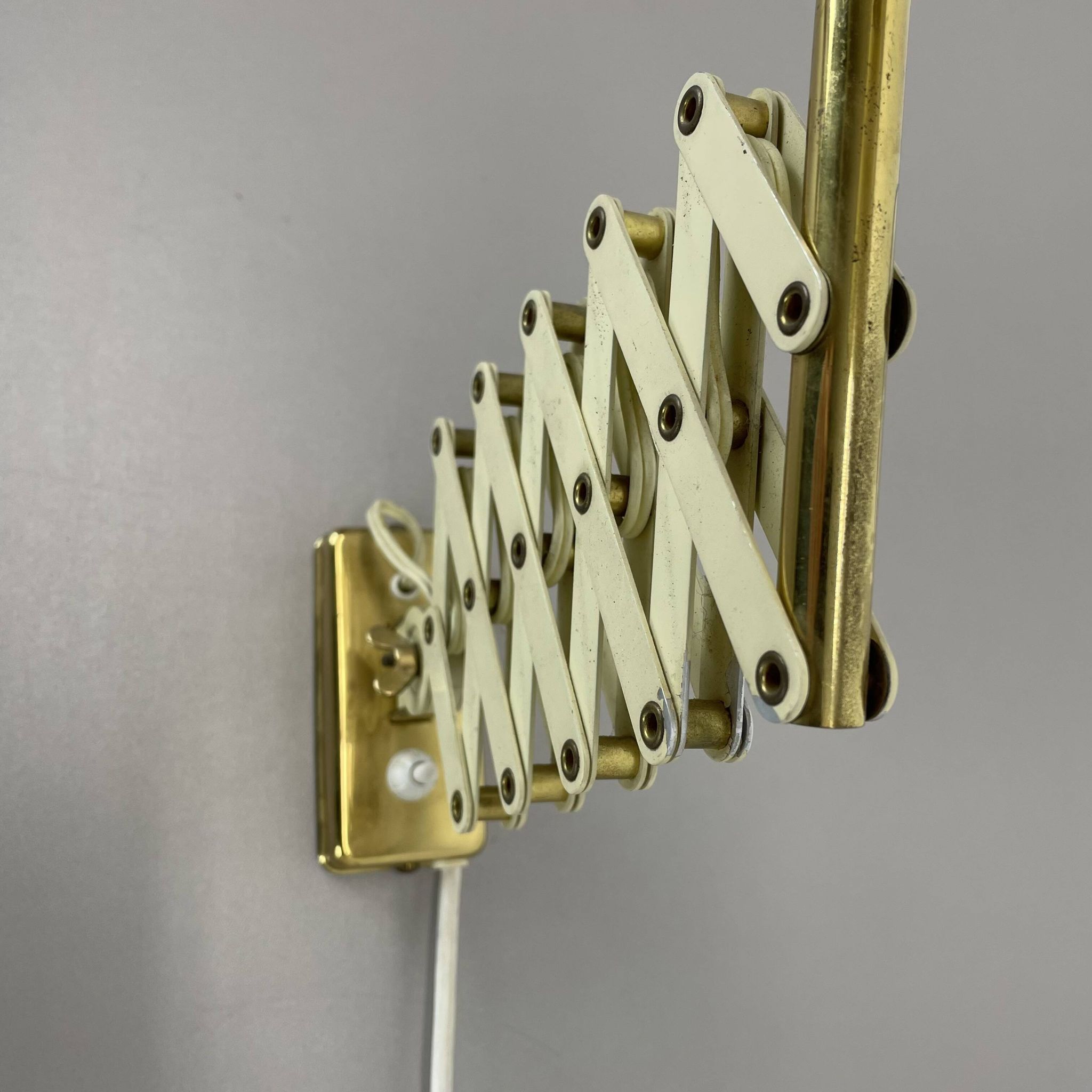 Original brass and metal scissors wall light by SIS Leuchten, Germany, 1950s.