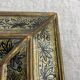 Eglomisé mirror with wooden parecloses