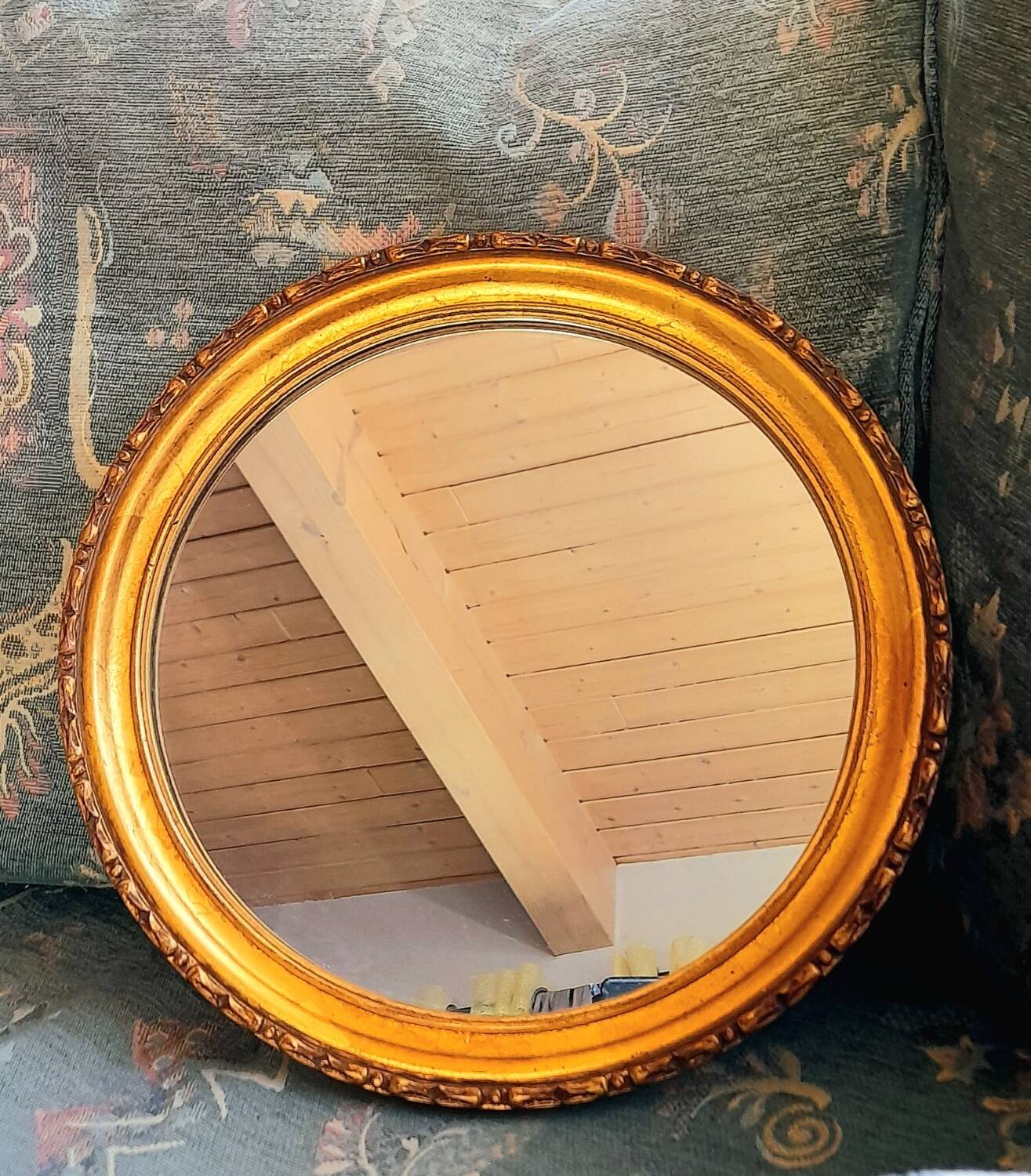 Round golden mirror