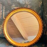 Round golden mirror