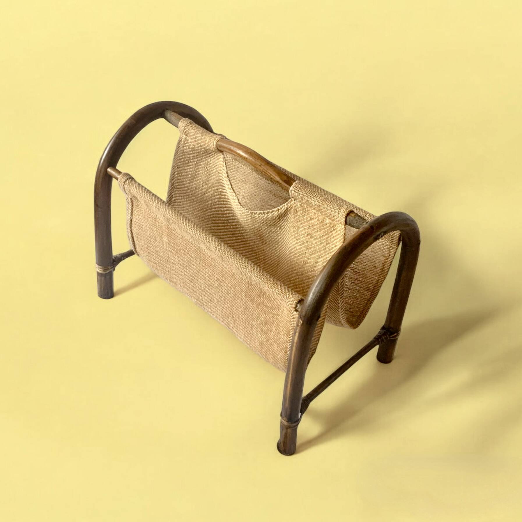 Vintage bamboo and fabric magazine rack