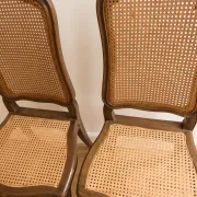 Set of 5 vintage caned chairs in classic style.