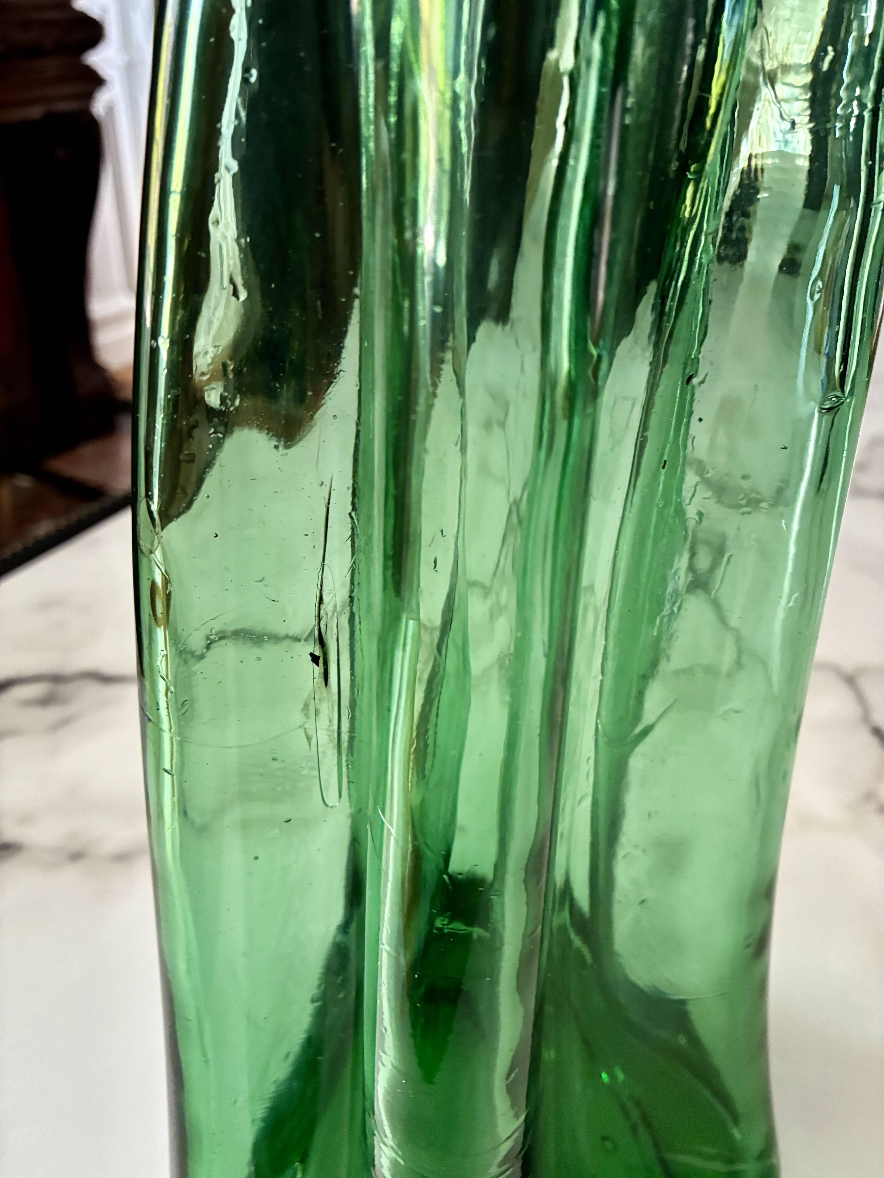 Vintage Viresa bottle in a flattened shape.