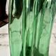 Vintage Viresa bottle in a flattened shape.