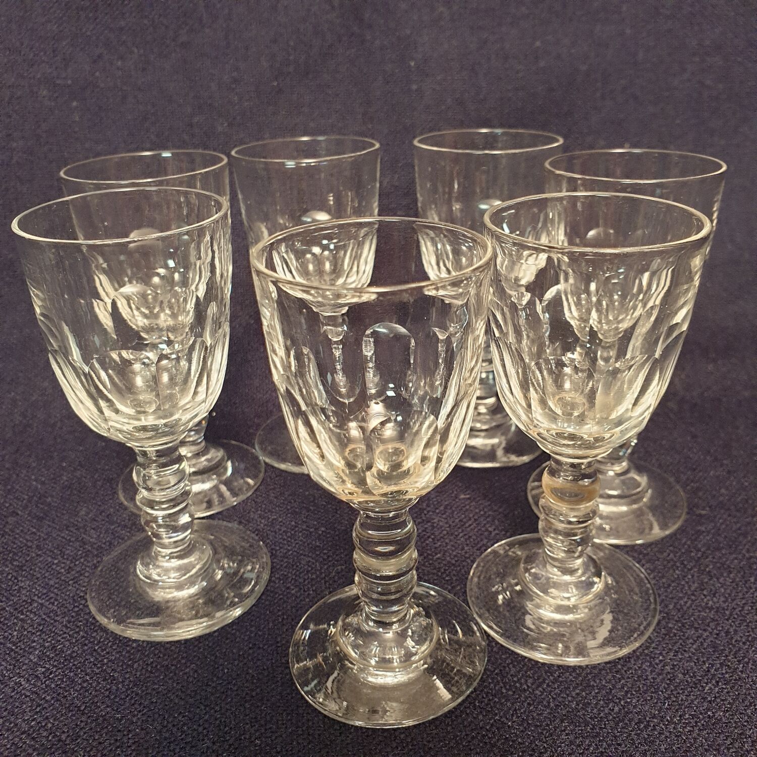 7 antique crystal shot glasses