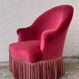 Old raspberry velvet toad armchair