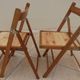 4 vintage varnished wooden folding chairs - Seats completely restored.