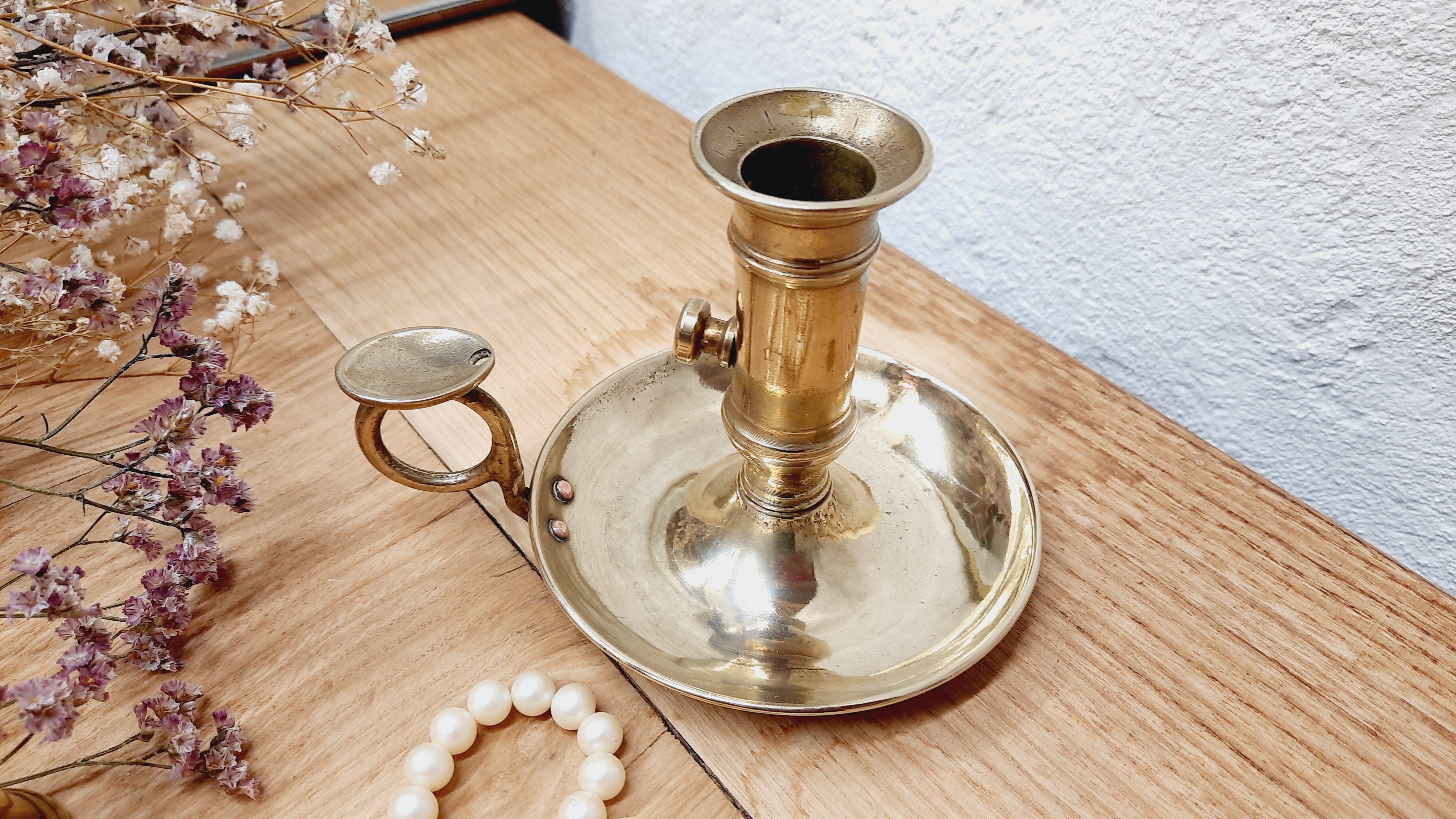 Cellar rat candle holder and brass extinguisher