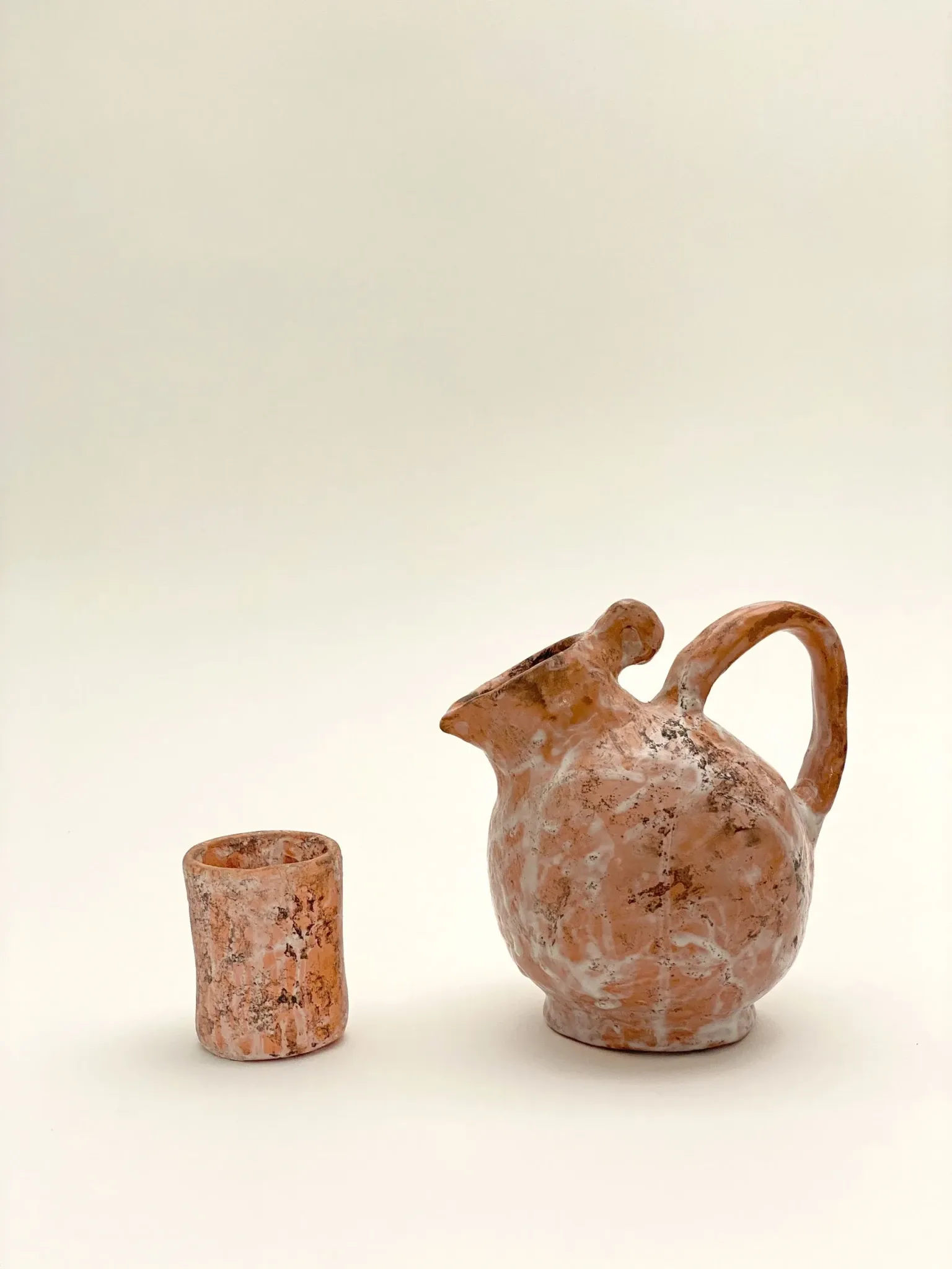 Clay jug and cups