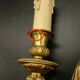 Pair of wall sconces in the Louis XVI quiver style in gilded bronze.
