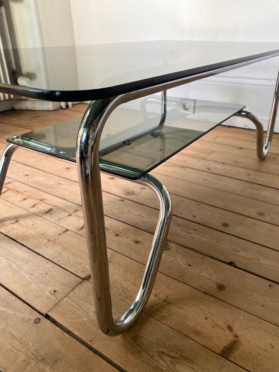 Tubular frame smoked glass coffee table 1970 vintage