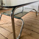 Tubular frame smoked glass coffee table 1970 vintage
