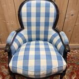 Louis XVI style bergère armchair in blackened wood