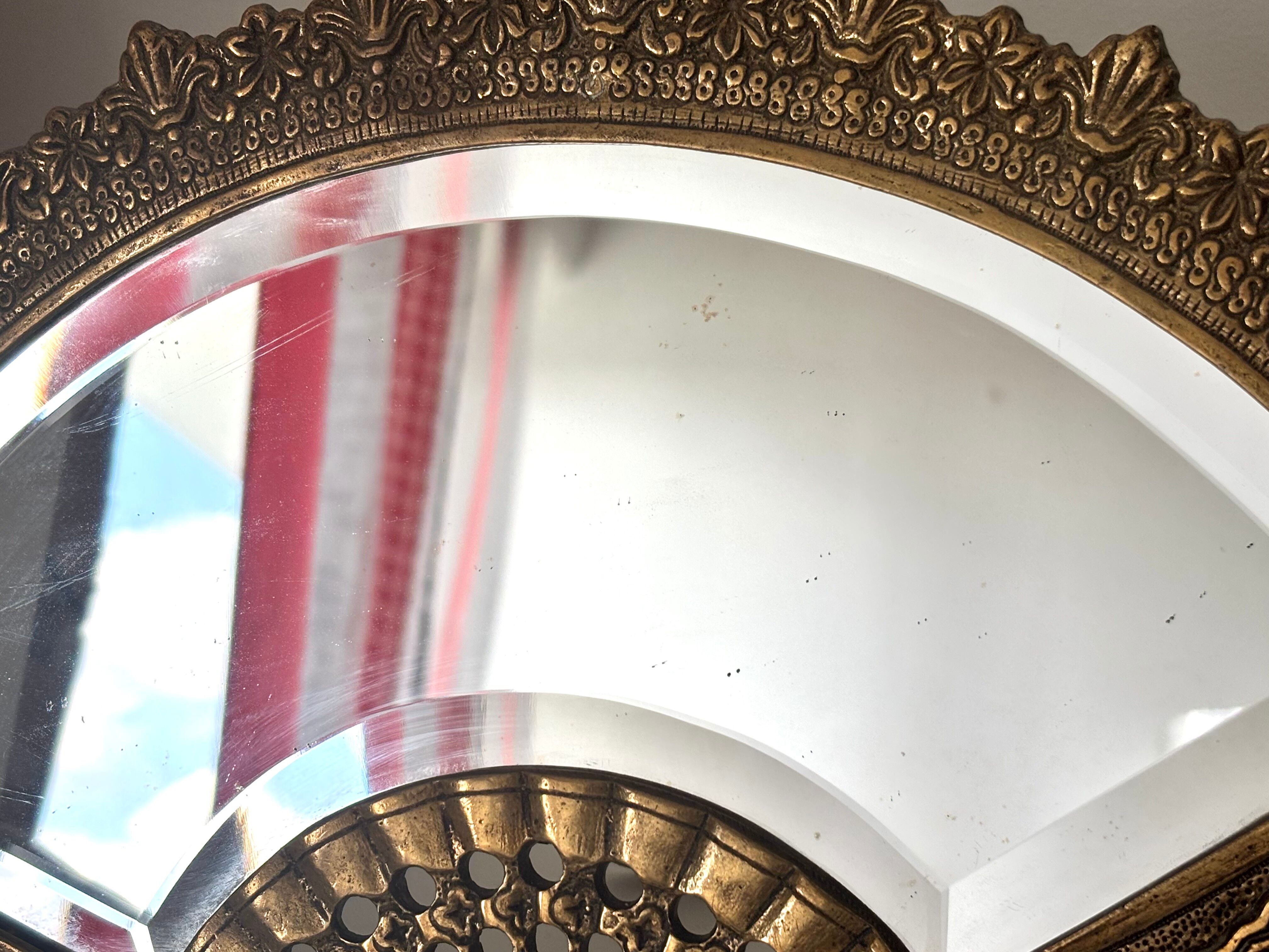 Antique brass mirror