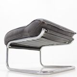 Chair and Ottoman in leather 1950 s