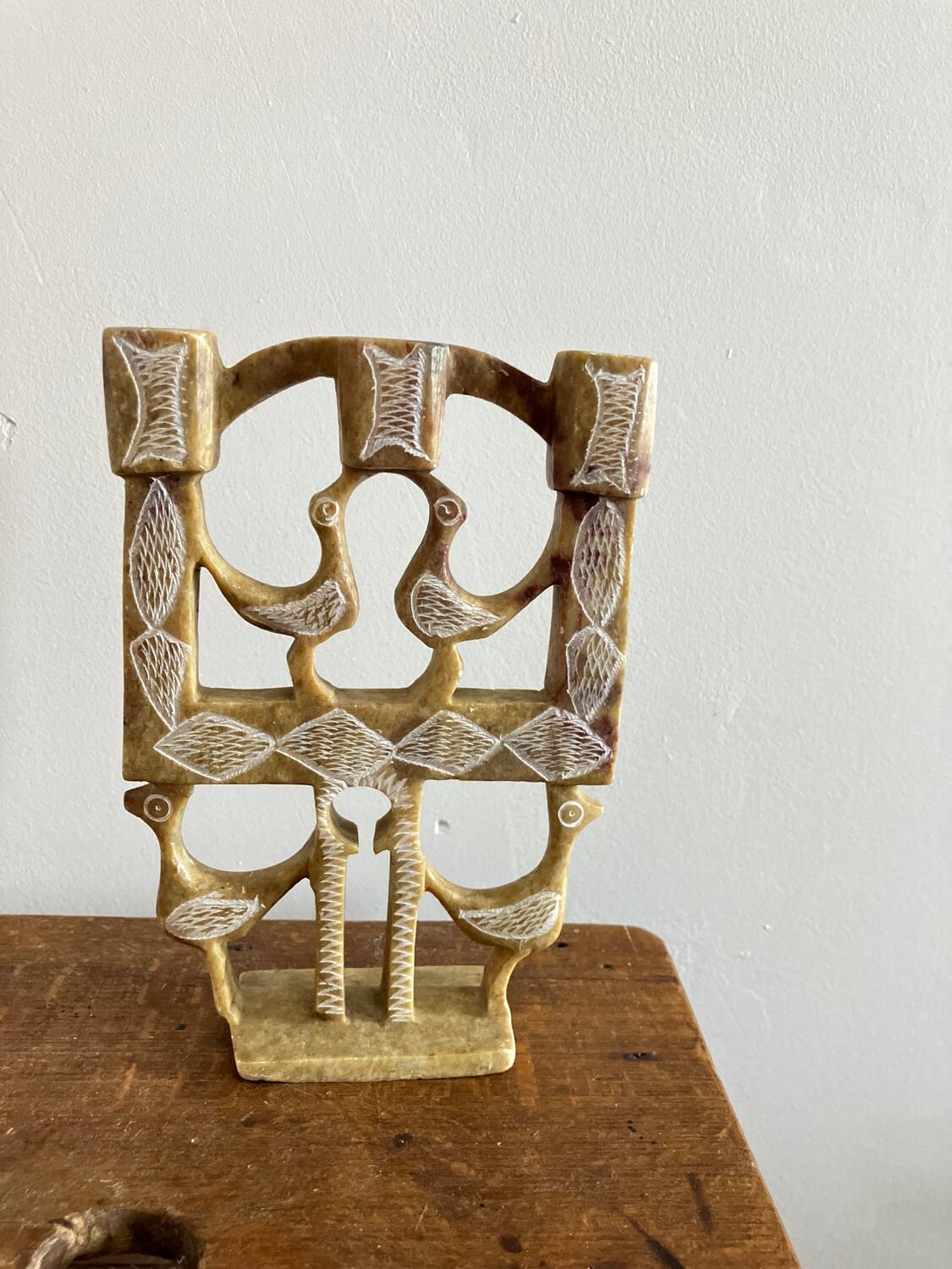 Vintage stone folk art candle holder