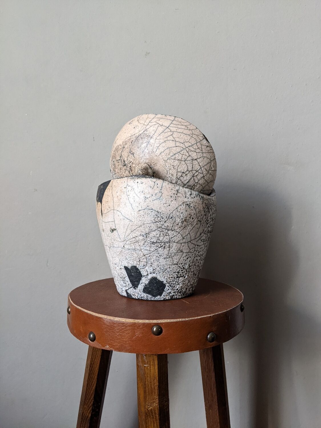 Handmade raku ceramic pot in contemporary Japandi design.