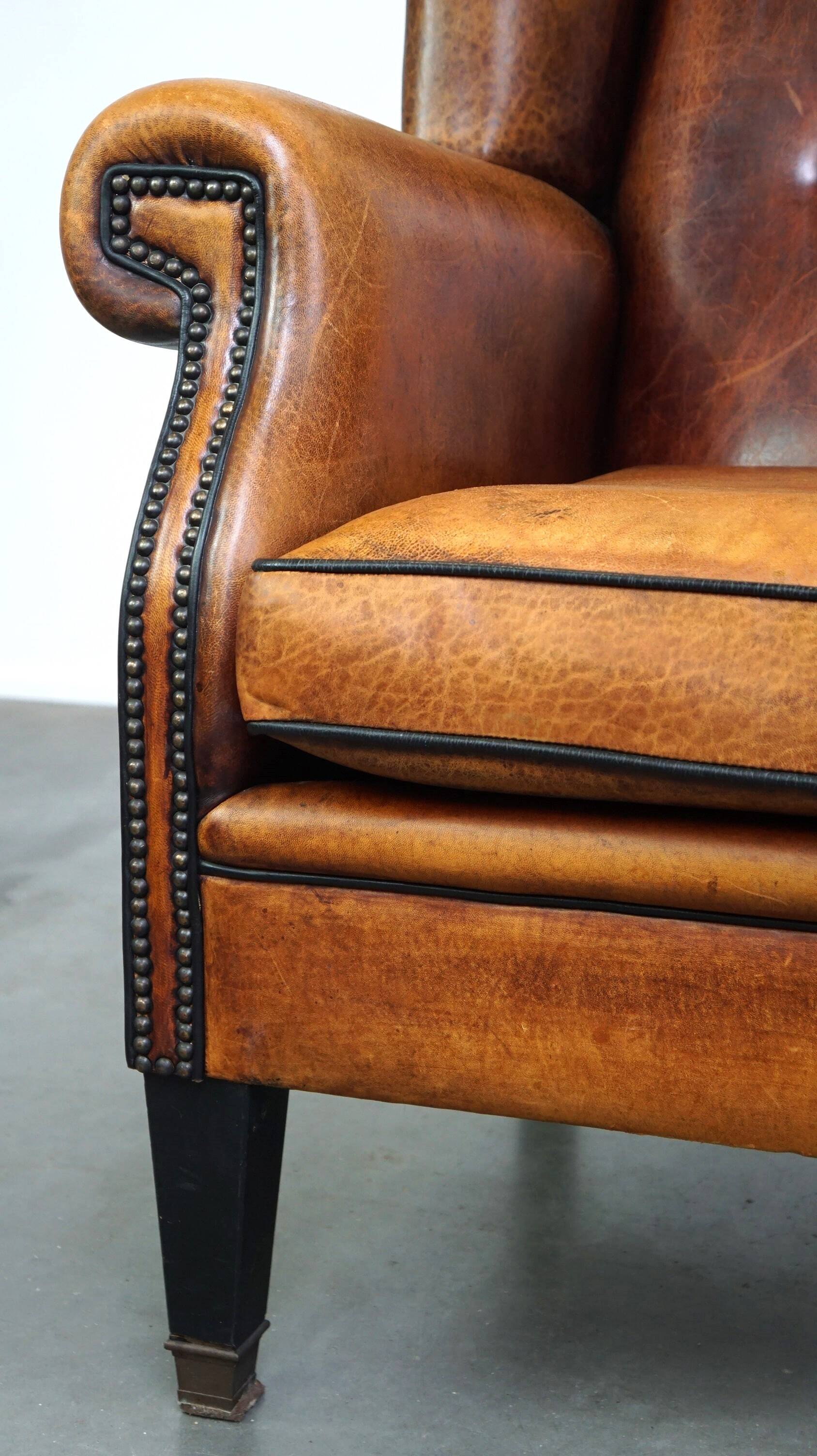 Sheepskin leather chair with a beautiful patina