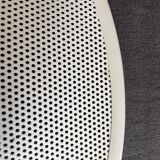 Suspension of the 80s in perforated white metal