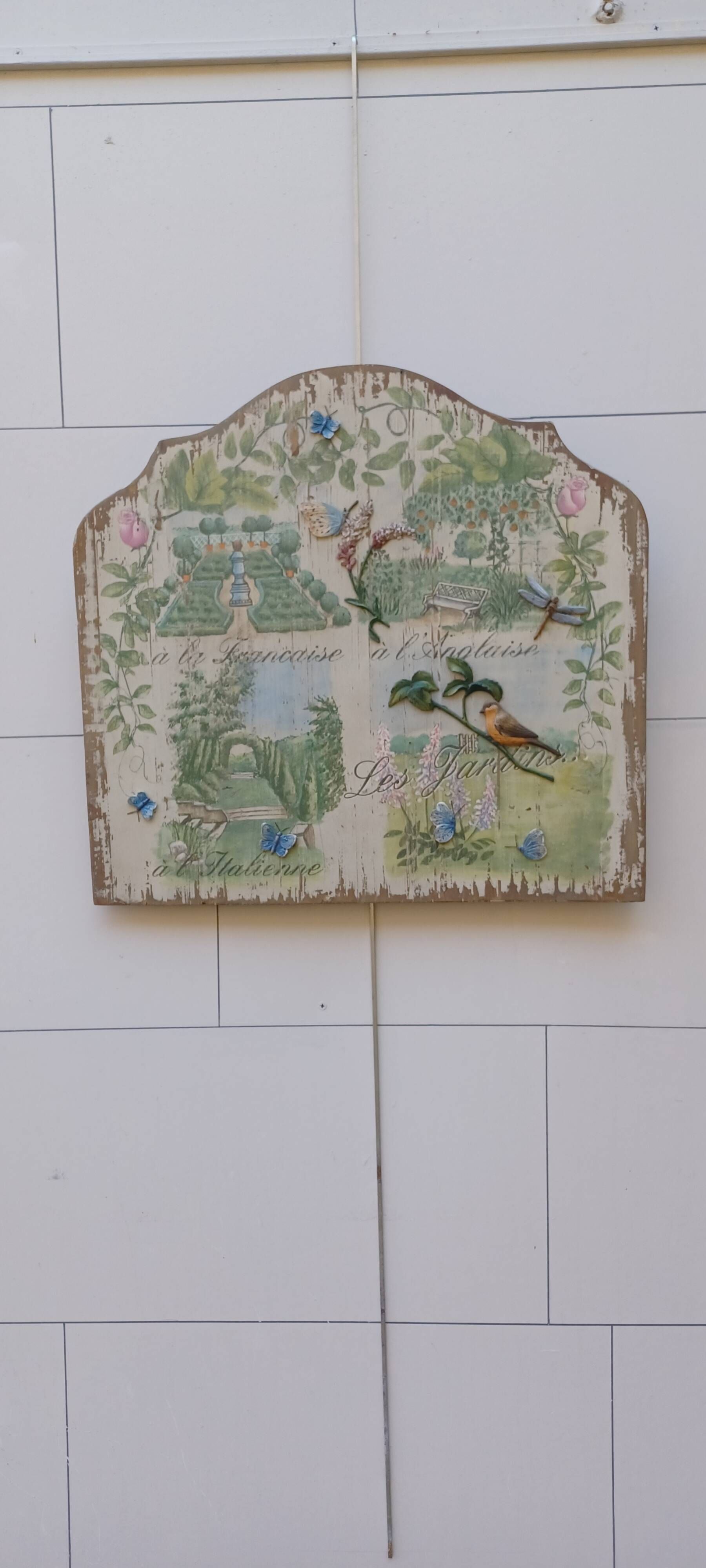Ancient decorative panel in carved wood on the art of gardens in europe