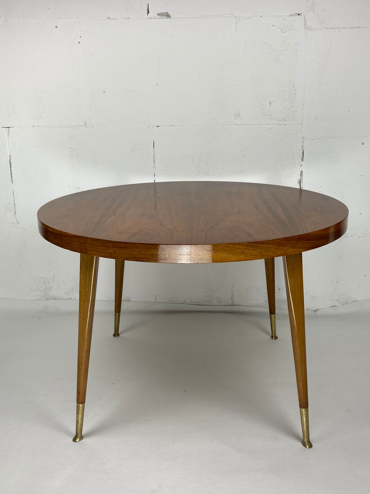 Italian round table with tapered brass leg ends, 1950s