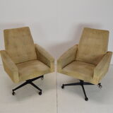 Pair of mid-century swivel armchairs with wheels 1970's