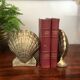 Pair of brass shell book clamps