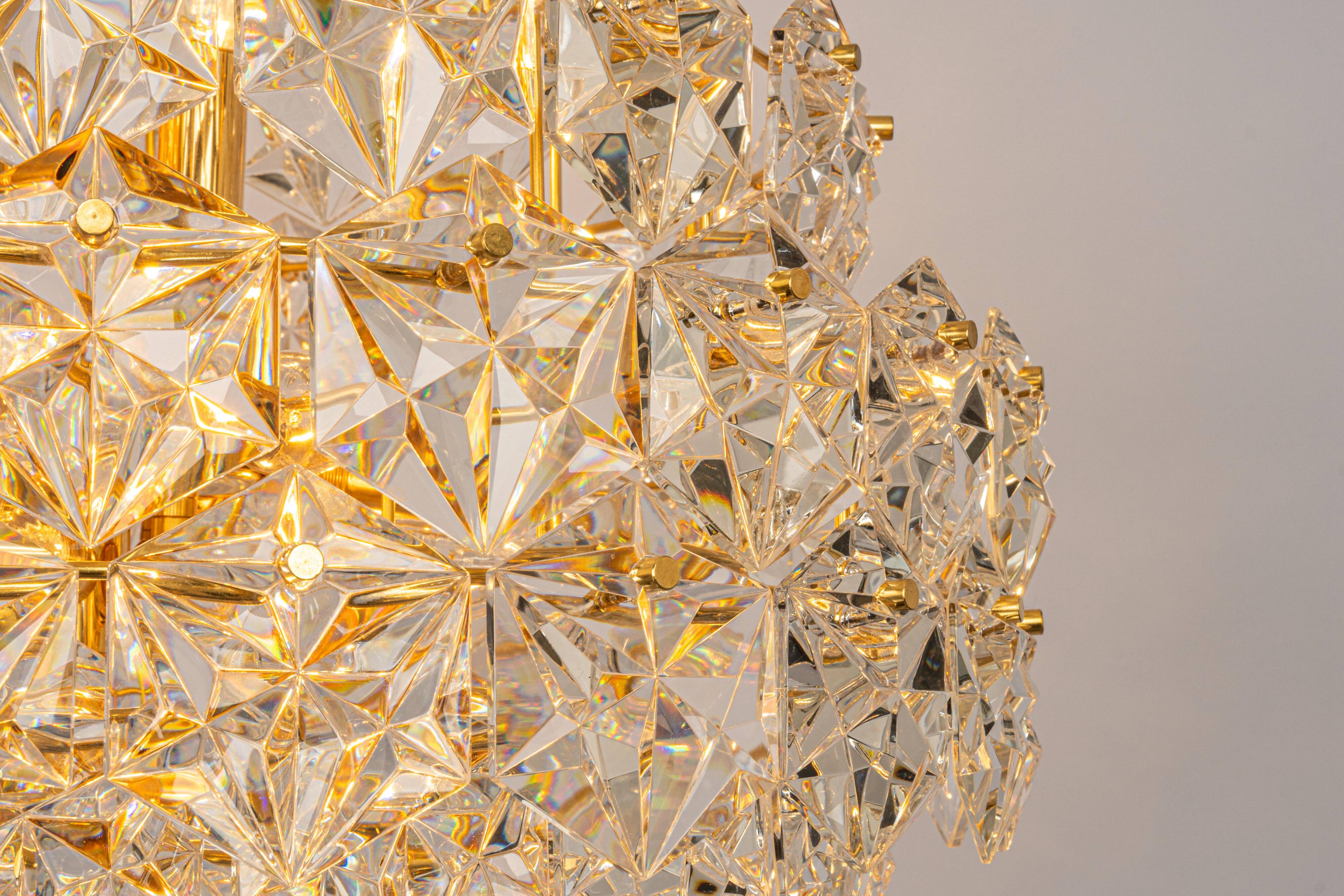 Chandelier, brass and crystal glass by Kinkeldey, Germany, 1970s.