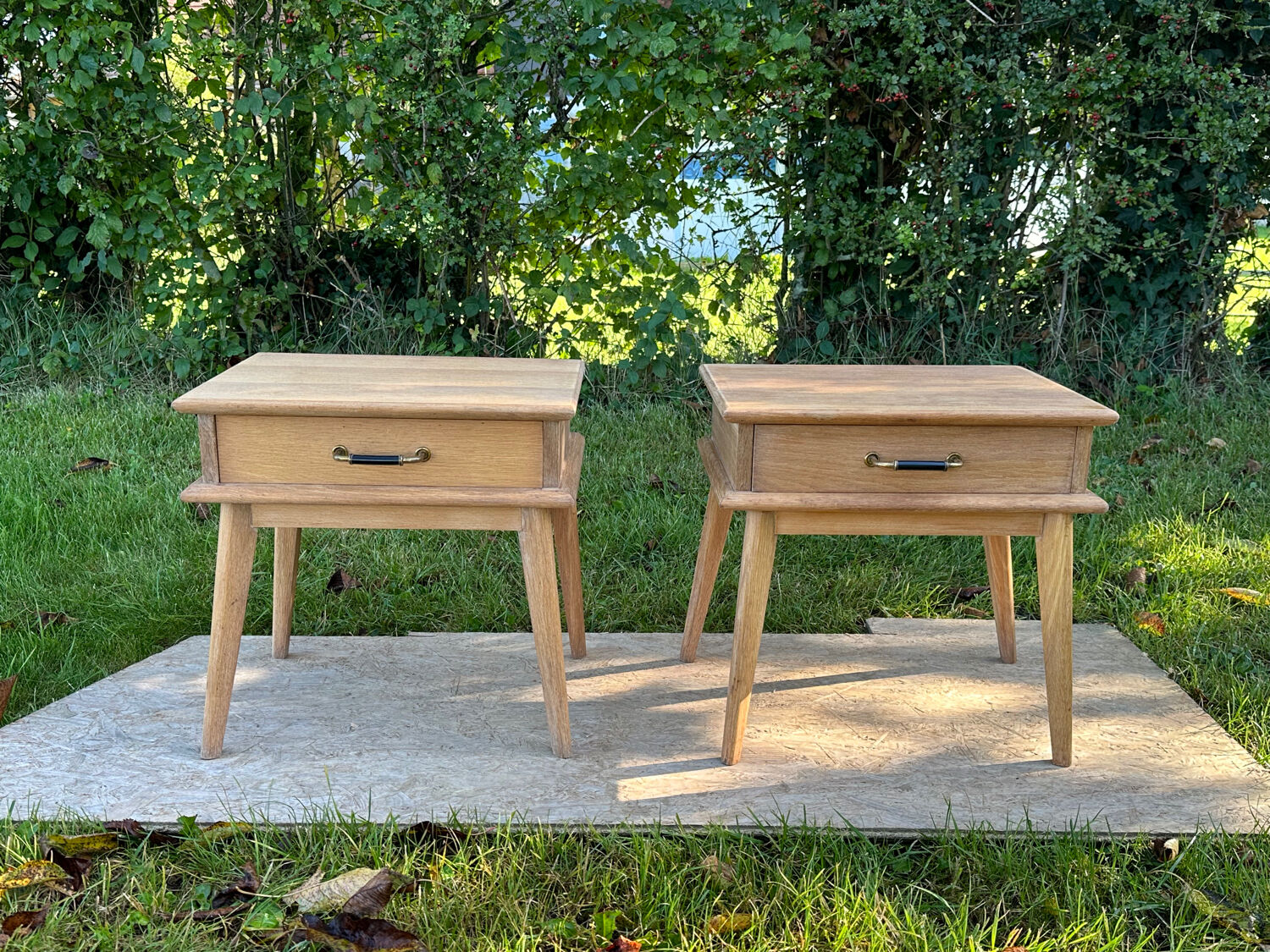 Vintage bedside tables with compass feet