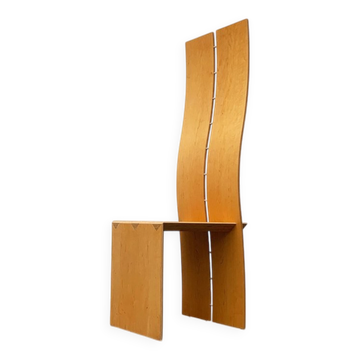 Postmodern chair with a high backrest