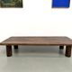 Modernist coffee table in solid elm, cylindrical pine base, 1970s.