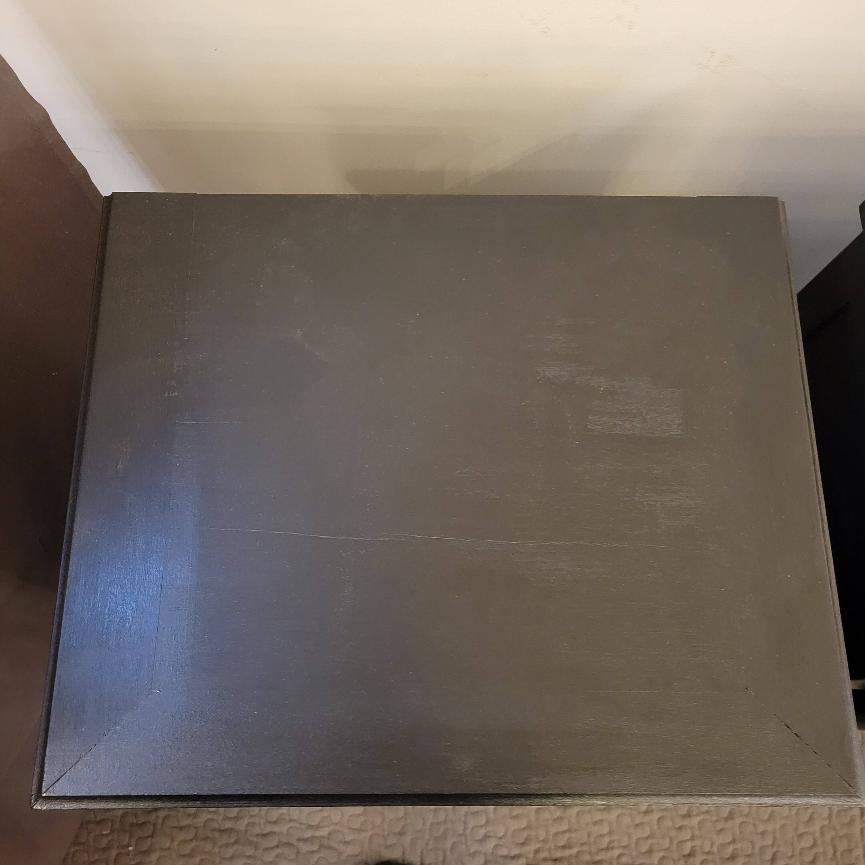 Pair of black patina bedside tables