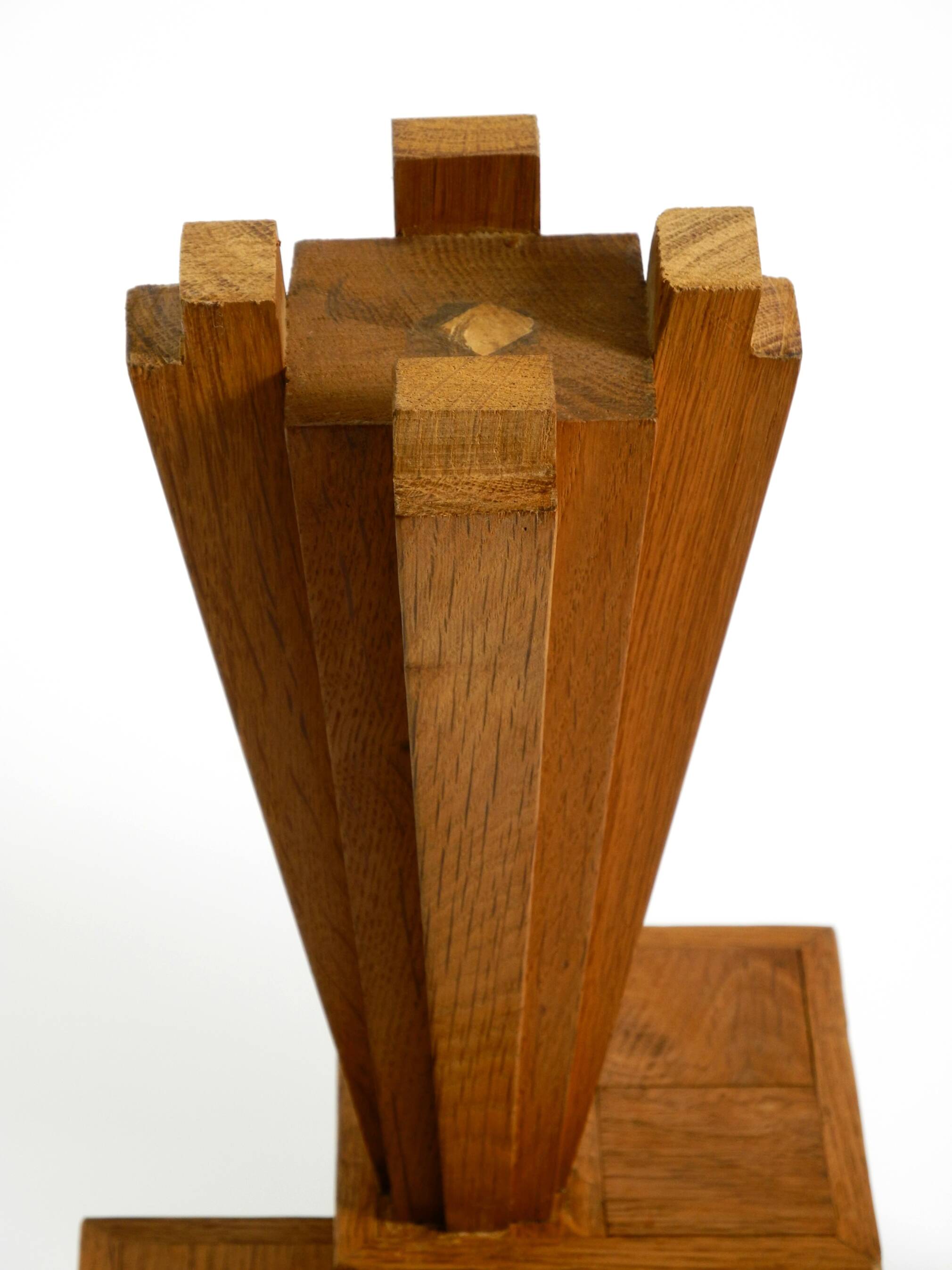 Two mid-century standing ashtrays consisting of red Alabaster cup