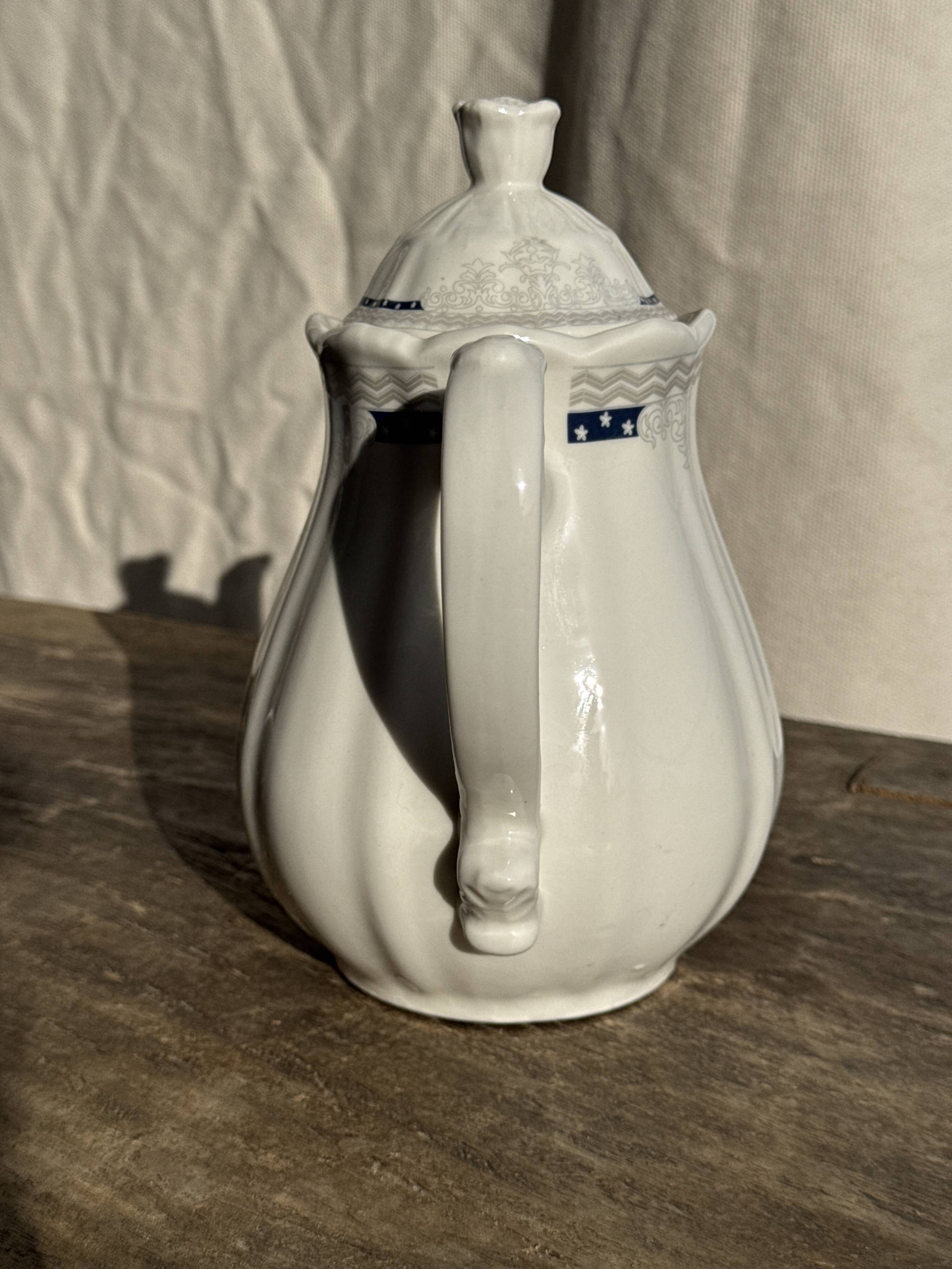 White earthenware teapot with blue and silver trim H22.5