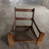 Armchairs in leather and vintage wood 70's