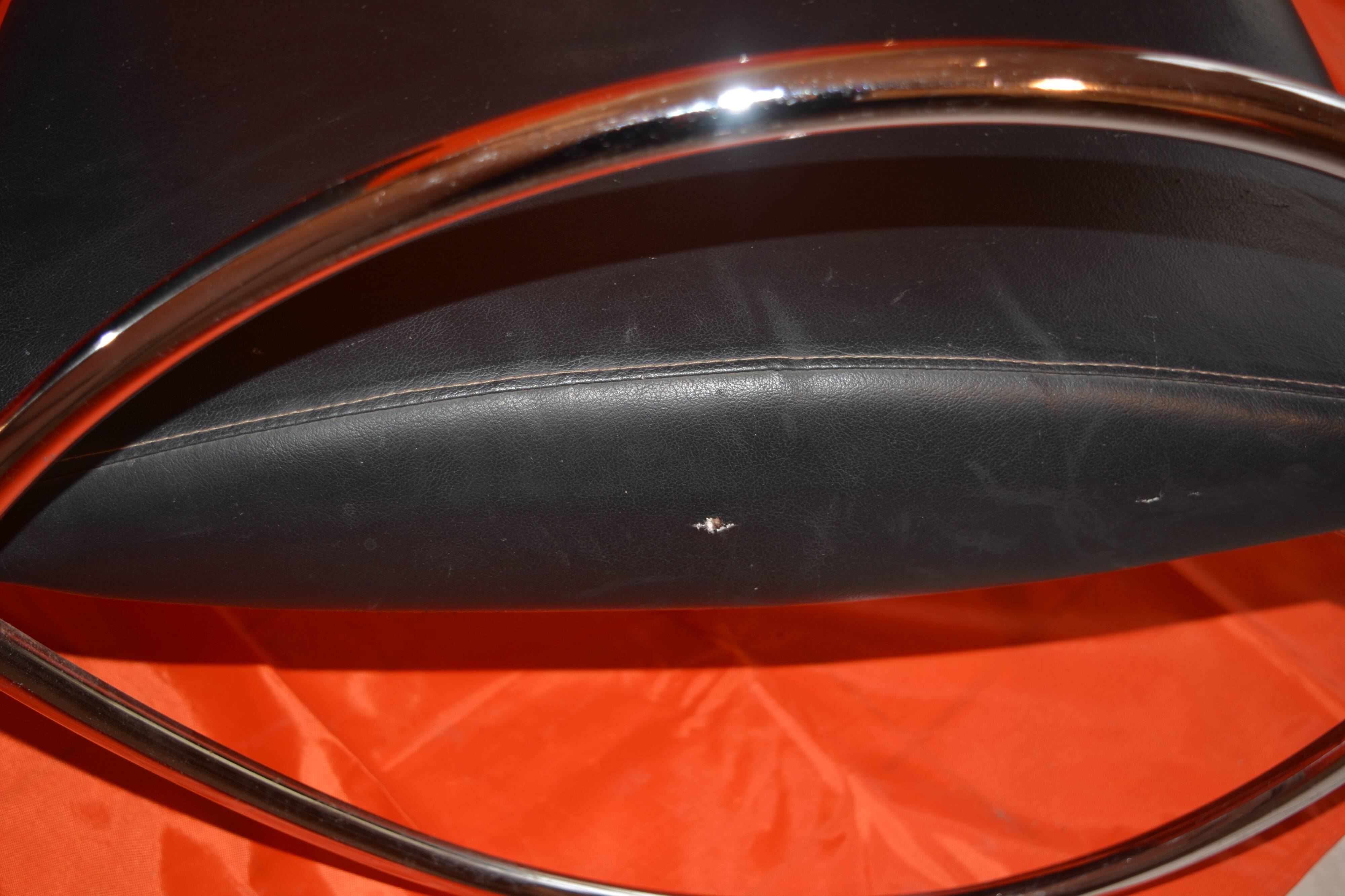 Vintage armchair in imitation leather and chrome steel tube